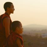Two young monks looking at scenery - Saffron Heart - THIS Buddhist Film Festival